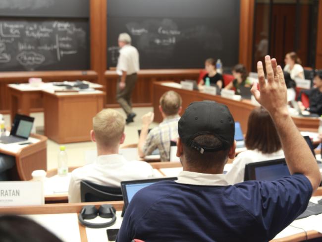 hand raised MBA exchange student